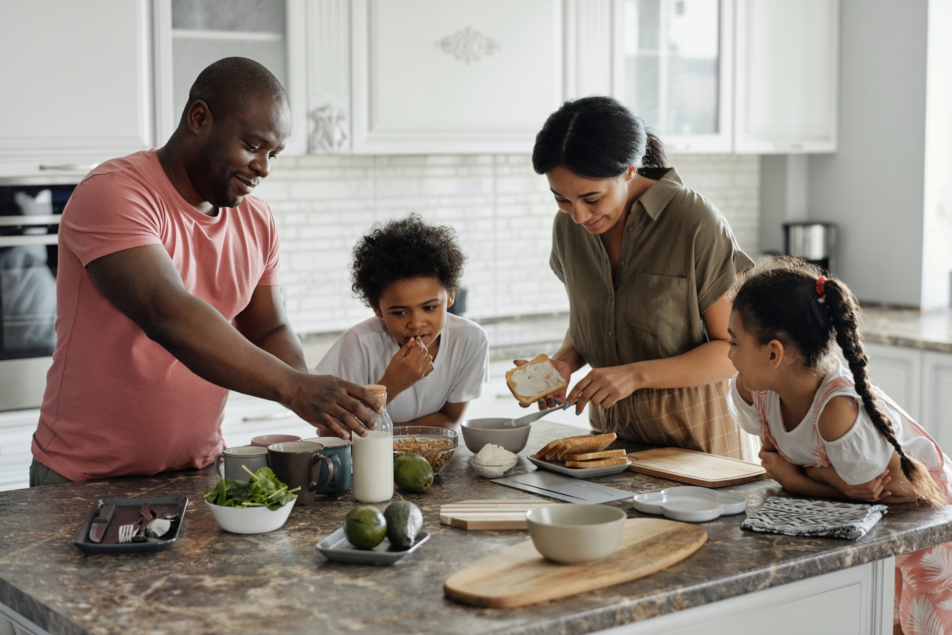 family-making-breakfast-in-the-kitchen-4259140